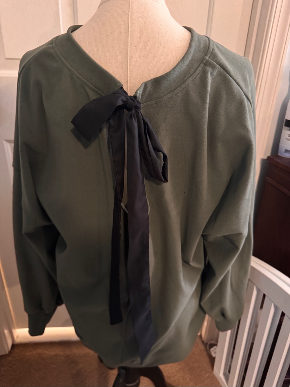 Bow back dark green sweater